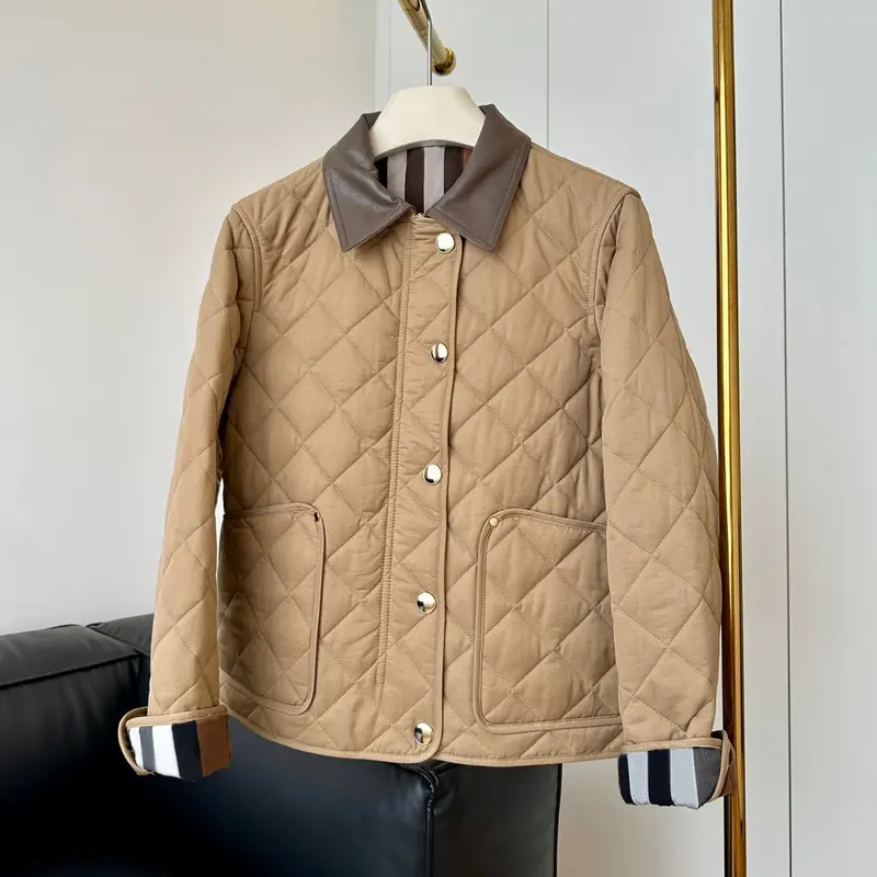 Damen Steppjacke mit Kontrastkragen aus Lederoptik und Druckknopfverschluss Drune