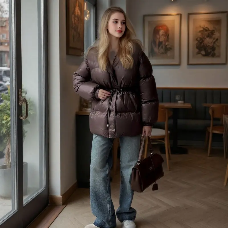 Damen Taillierte Steppjacke in Daunenoptik mit Tunnelzug und Kapuze Drune