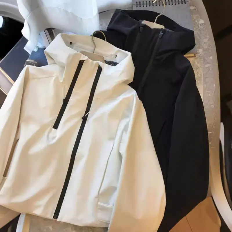 Damen Wasserabweisende Kapuzenjacke im minimalistischen Urban-Design mit verdecktem Reißverschluss Drune