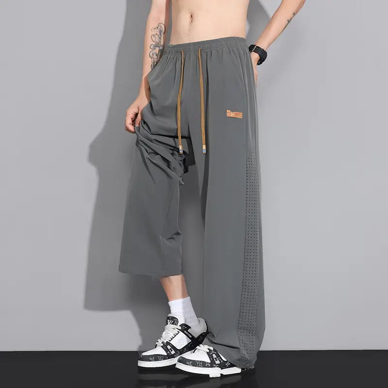 Herren Atmungsaktive Sporthose mit Netzbesätzen