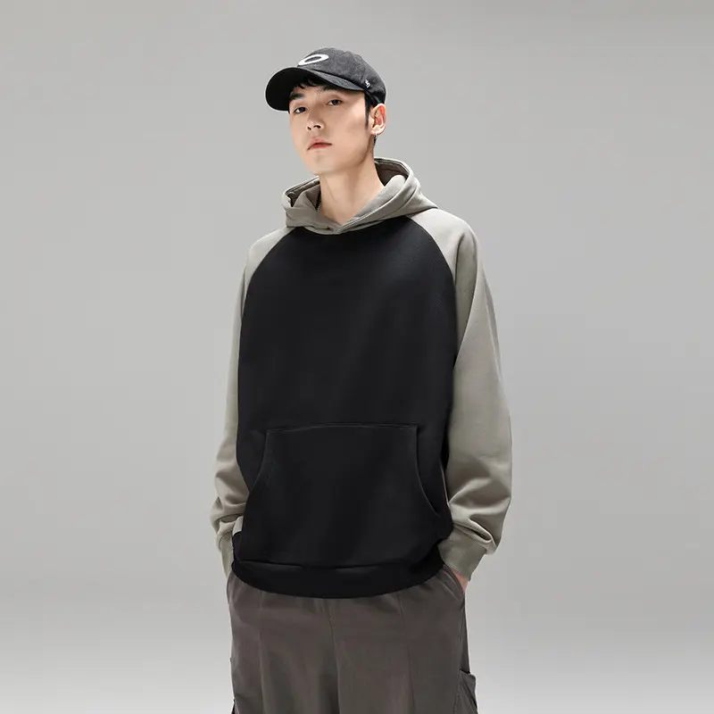 Herren Kapuzenpullover im Colourblock-Design mit Raglanärmeln, Kängurutasche und geripptem Saum Drune