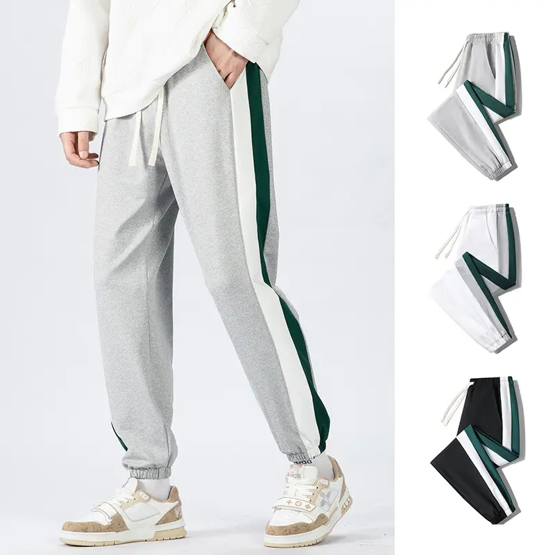 Herren Konische Trackhose mit Kordelzug, seitlichen Colorblock‑Streifen & elastischen Bündchen Drune