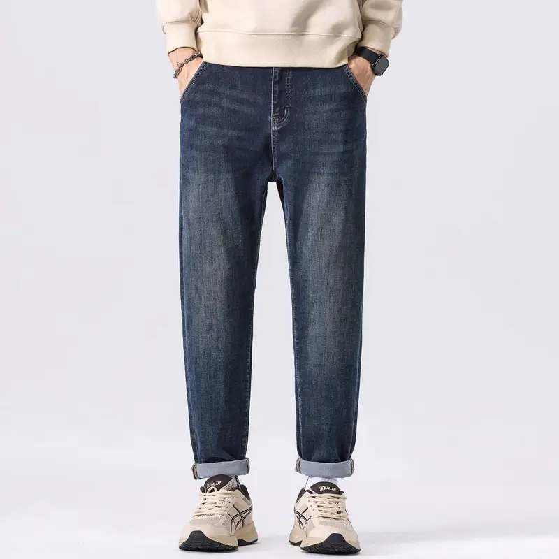 Herren Tapered-Denimhose mit mittelhohem Bund, gekrempeltem Saum und dezenter Used-Waschung Drune